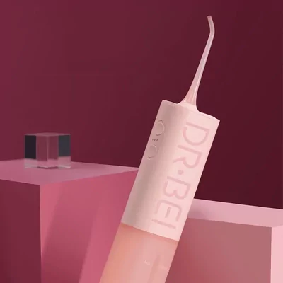 Розовый ирригатор